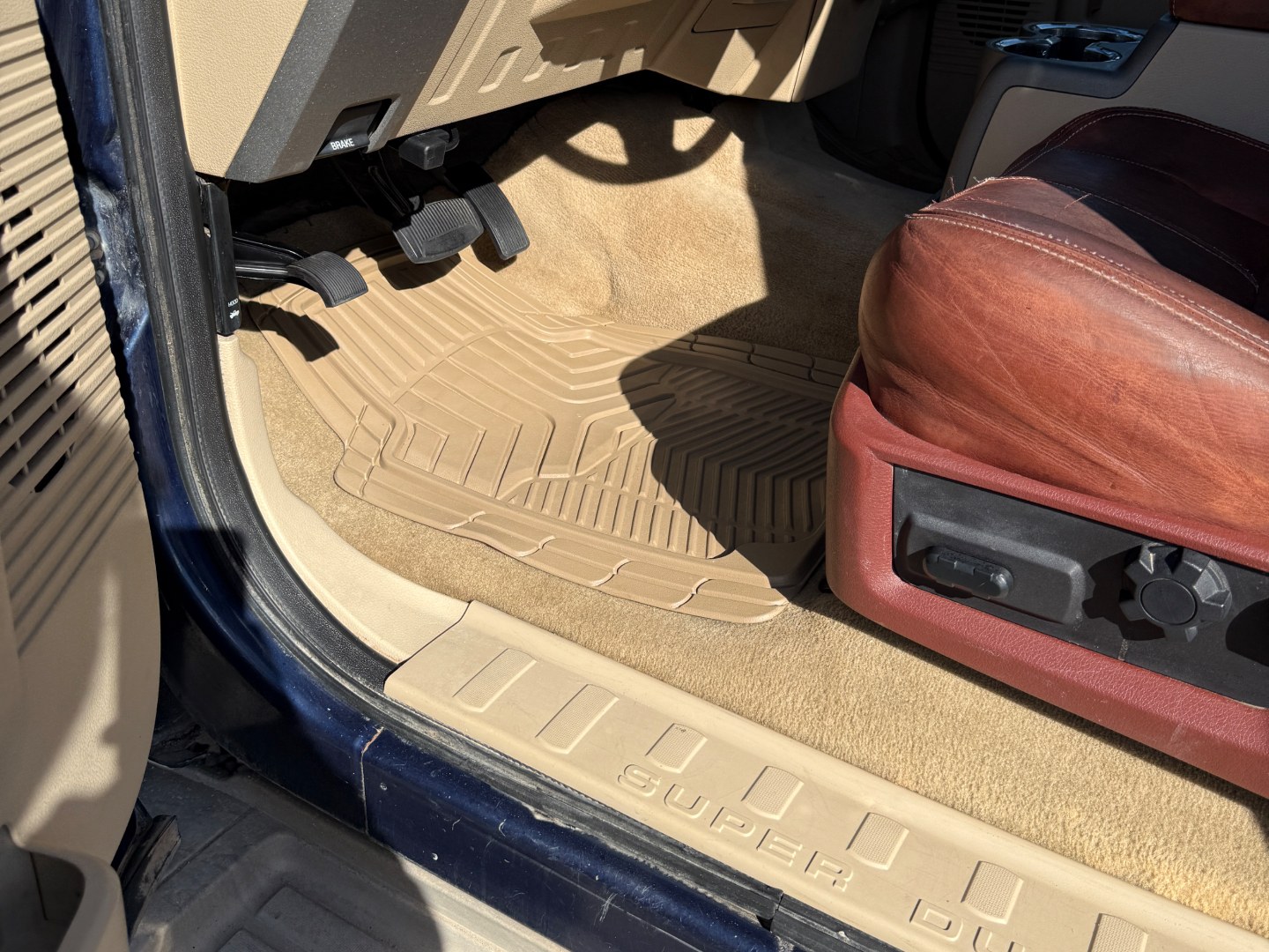 Truck cabin carpet and floor mat before and after shampooing — after